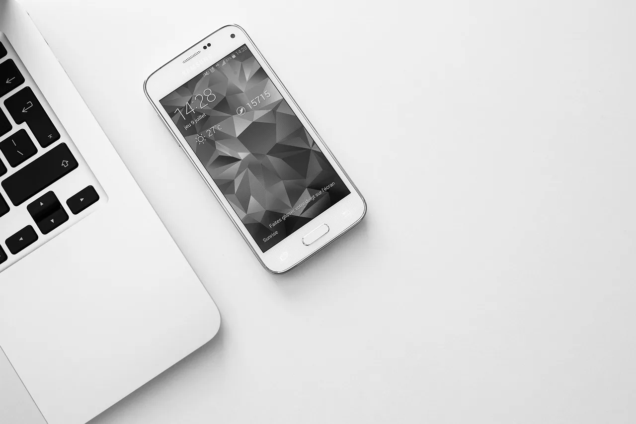 smartphone, mobile, laptop, computer, technology, business, black and white, smartphone, smartphone, mobile, mobile, mobile, mobile, mobile, laptop, computer, technology. AI Features on Phones and Laptops: Hype Versus Evidence