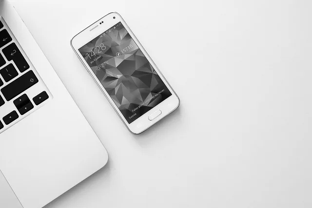 smartphone, mobile, laptop, computer, technology, business, black and white, smartphone, smartphone, mobile, mobile, mobile, mobile, mobile, laptop, computer, technology. AI Features on Phones and Laptops: Hype Versus Evidence