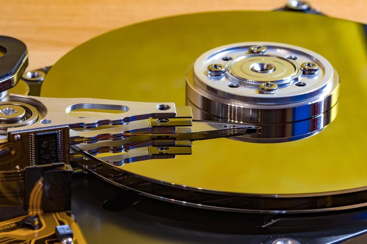 hard drive, inside, macro, reading head, engine, digital, vacuum, data, computer, hard drive, hard drive, hard drive, hard drive, hard drive. A fictional synchronized deletion recovery case