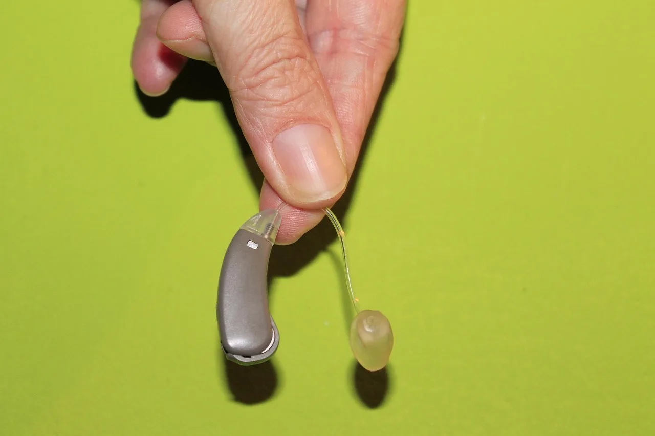 hand, hearing aid, hearing loss, listen, hearing aid, hearing aid, hearing aid, hearing aid, hearing aid. How FCC hearing aid compatibility rules affect your next phone purchase