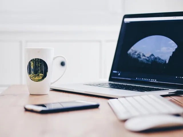 macbook, laptop, computer, technology, keyboard, mouse, iphone, mobile, smartphone, office, desk. Which US state privacy laws govern your cloud backup after a device fails?