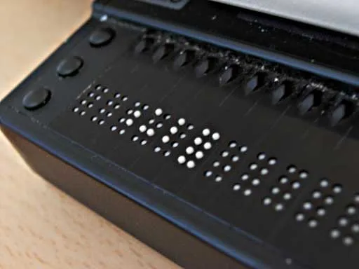 Close view of raised pins on a refreshable braille display